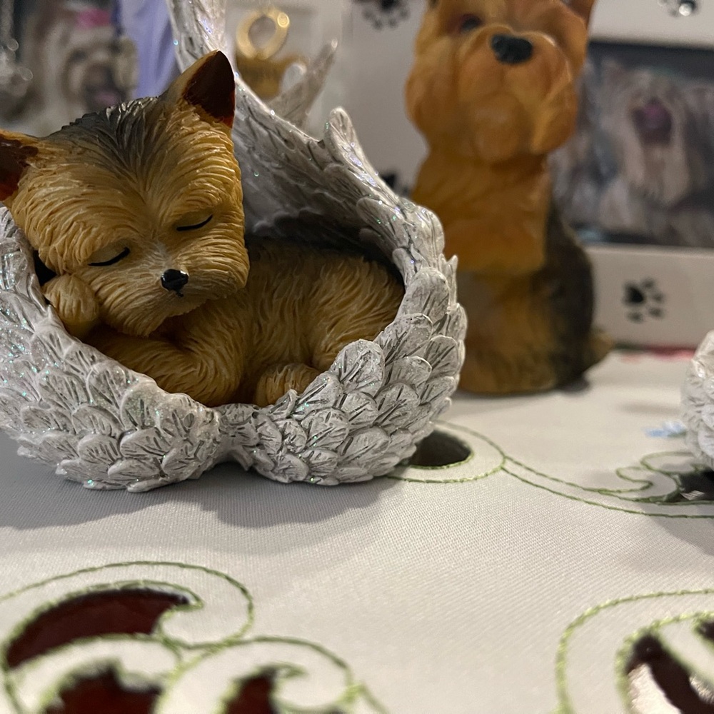 Adorable Dog Figurine in Leaf Cradle